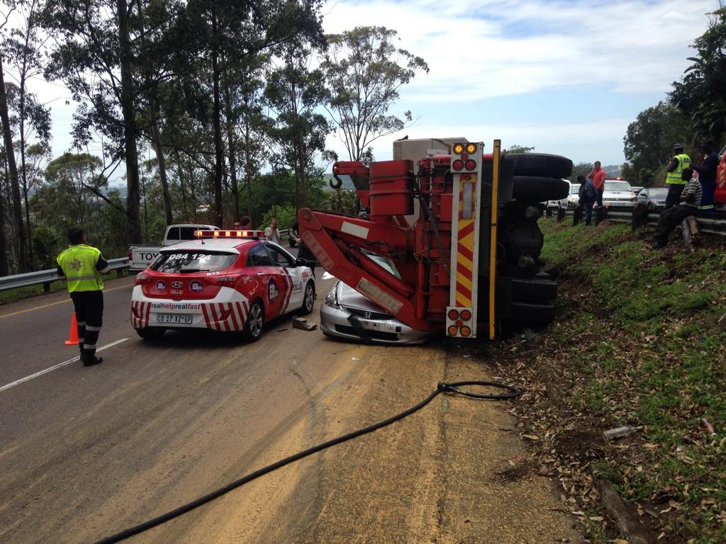 Truck crushes car, killing woman (2)