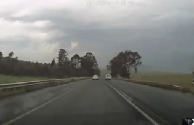 Near-miss after illegal overtaking caught on dashboard camera