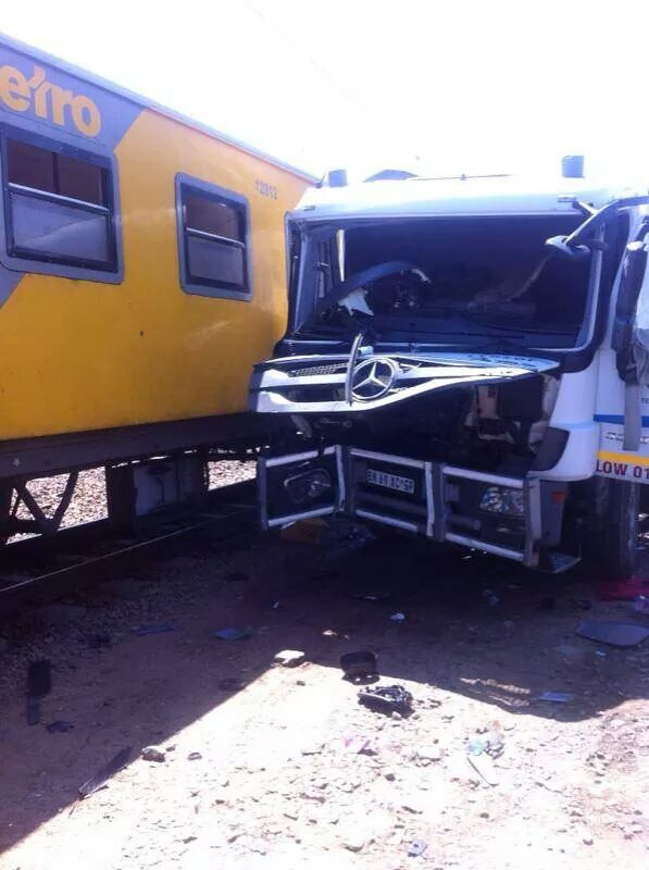 Photos after truck collided with train on Refinery road in Germiston