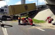 Two injured after truck drives off bridge