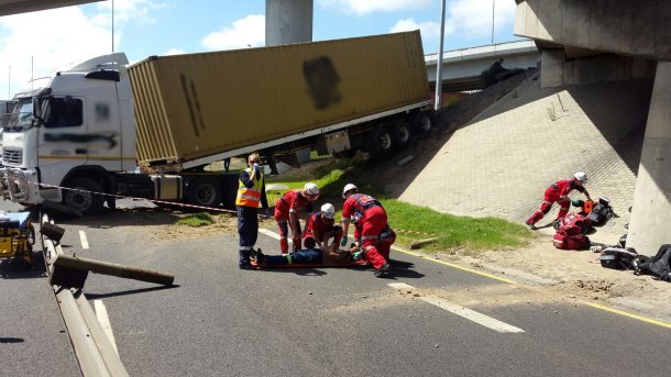 Two injured after truck drives off bridge