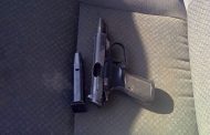 Arrest made and illegal firearm recovered when vehicle from which beer bottle was thrown is stopped