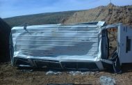 Twelve people have been injured when a minibus overturned on the R74