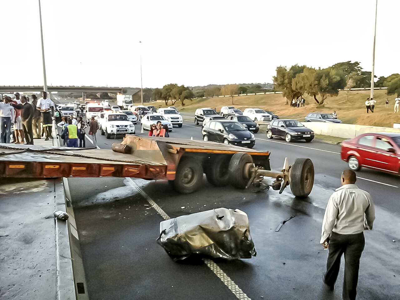 N1 N 14 interchange truck crash from bridge leaves one injured - roadway closed