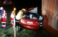 Car drives off bridge injuring two