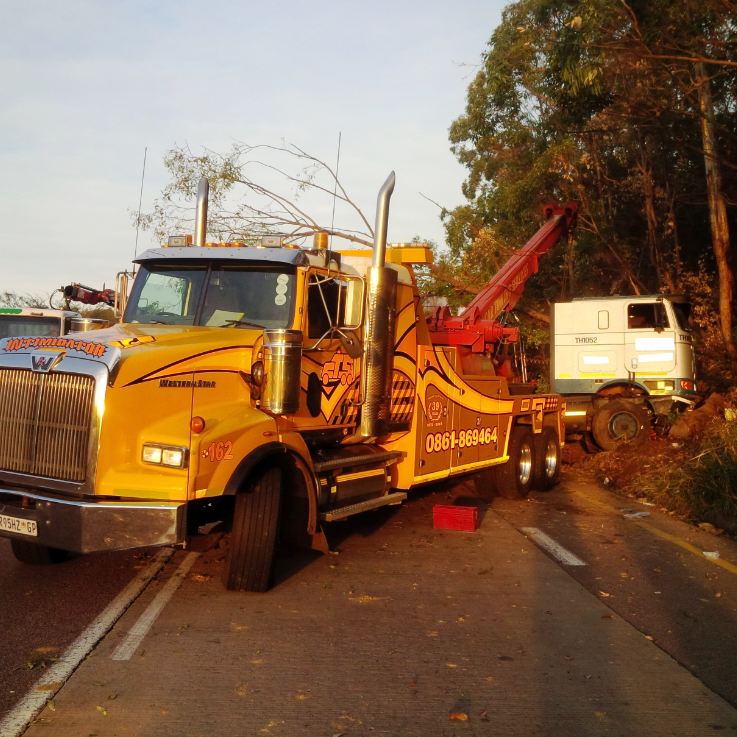 tow truck freeing pedestrian