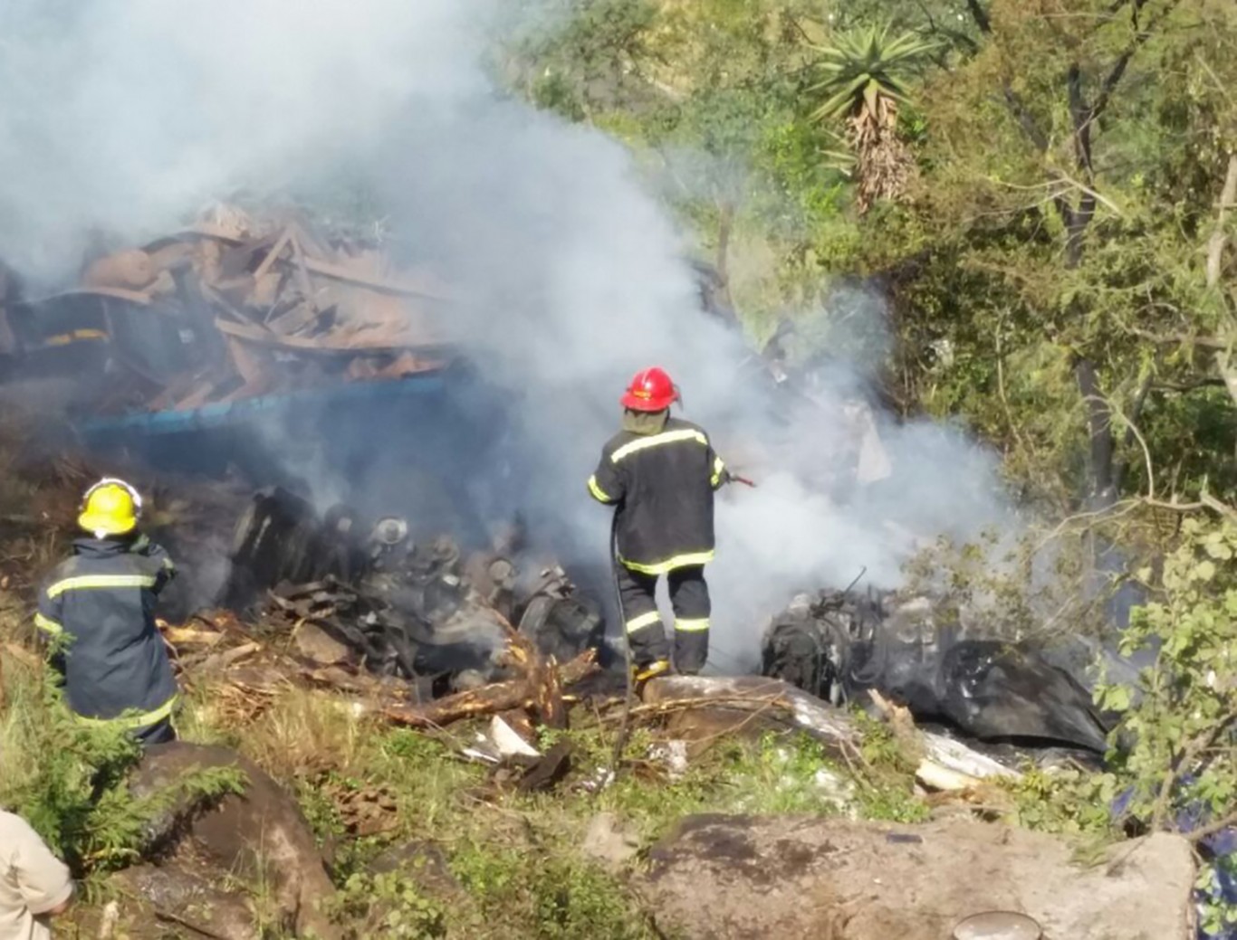 Three dead after truck rolls and catches alight in Barberton