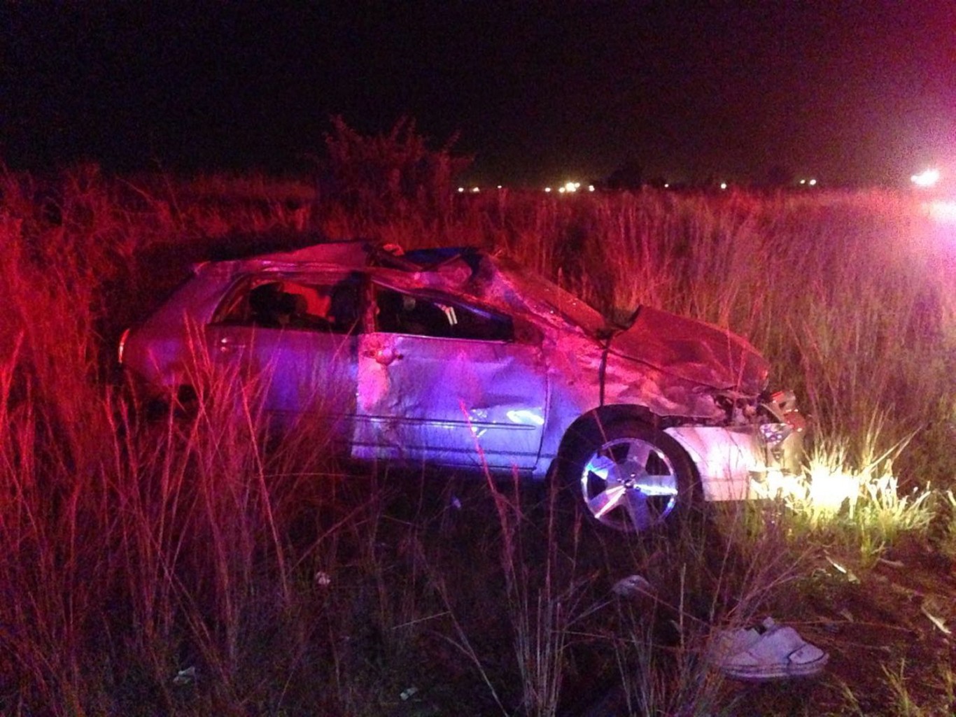 One dead, four injured after vehicle rolls