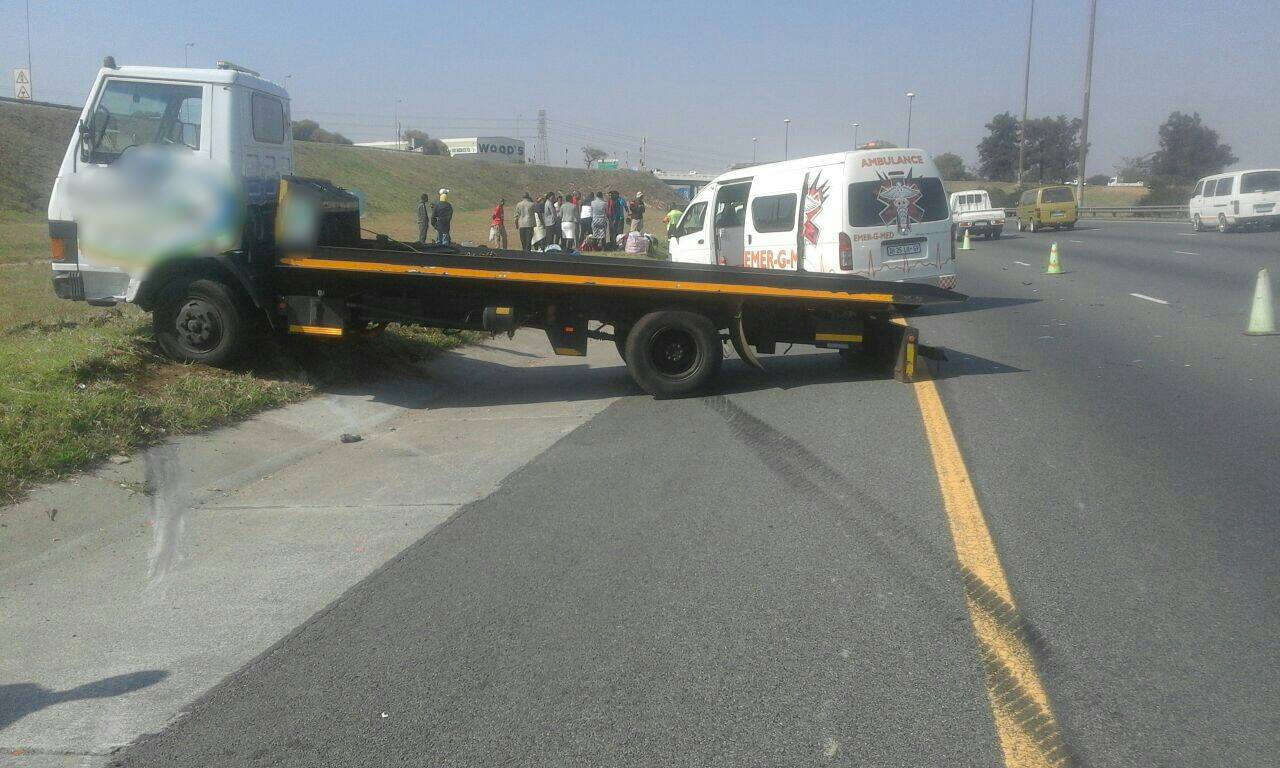 Three injured when taxi is rear-ended into flat bed truck in Alberton