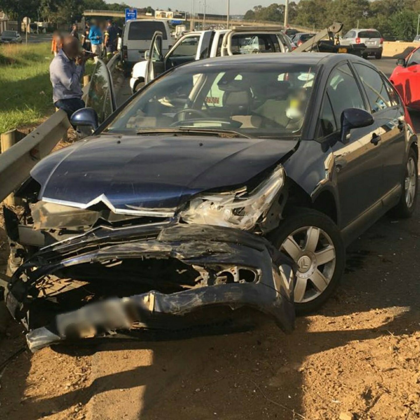 Taxi crashes into car and a barrier on the M1 North after Marlboro Drive