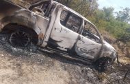 Manhunt launched for suspects after reportedly missing person is found in burnt-out vehicle