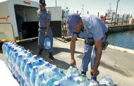 Members of the SAPD handed out water to their counterparts in Cape Town