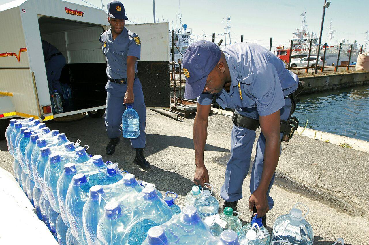 Members of the SAPD handed out water to their counterparts in Cape Town