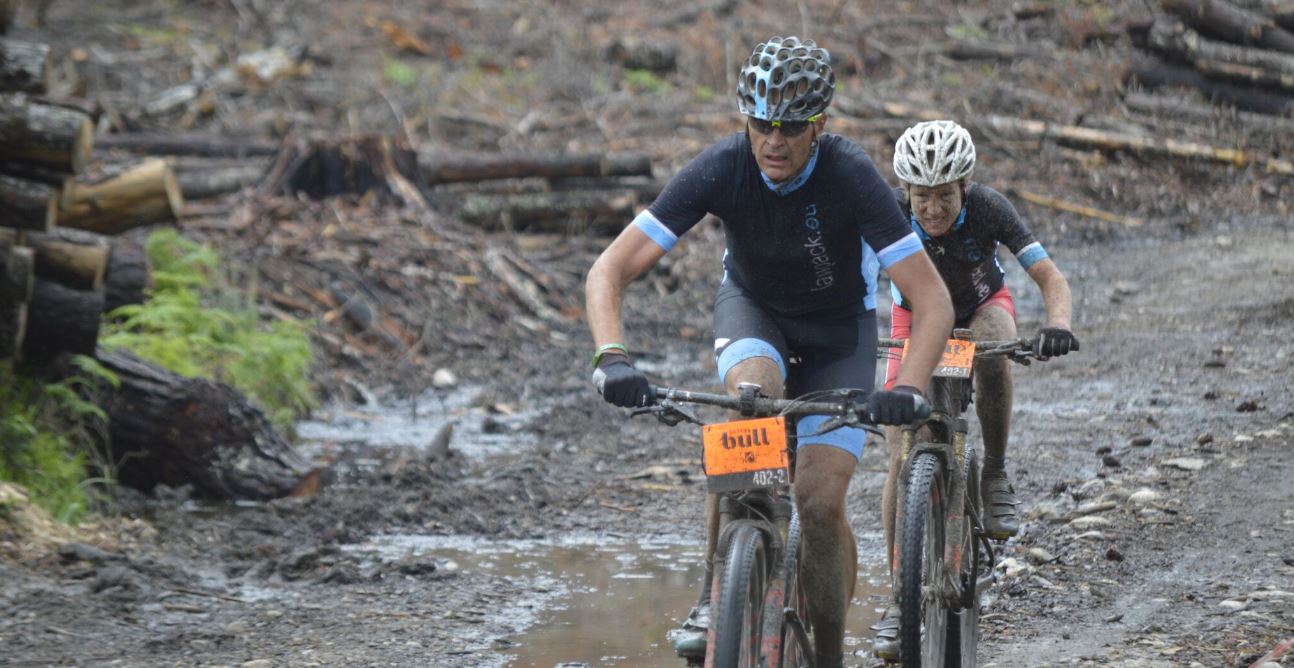 Solo rider Dylan Rebello on song at muddy Knysna Bull MTB race