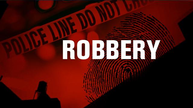 Police searching for an armed robbery suspect in East London
