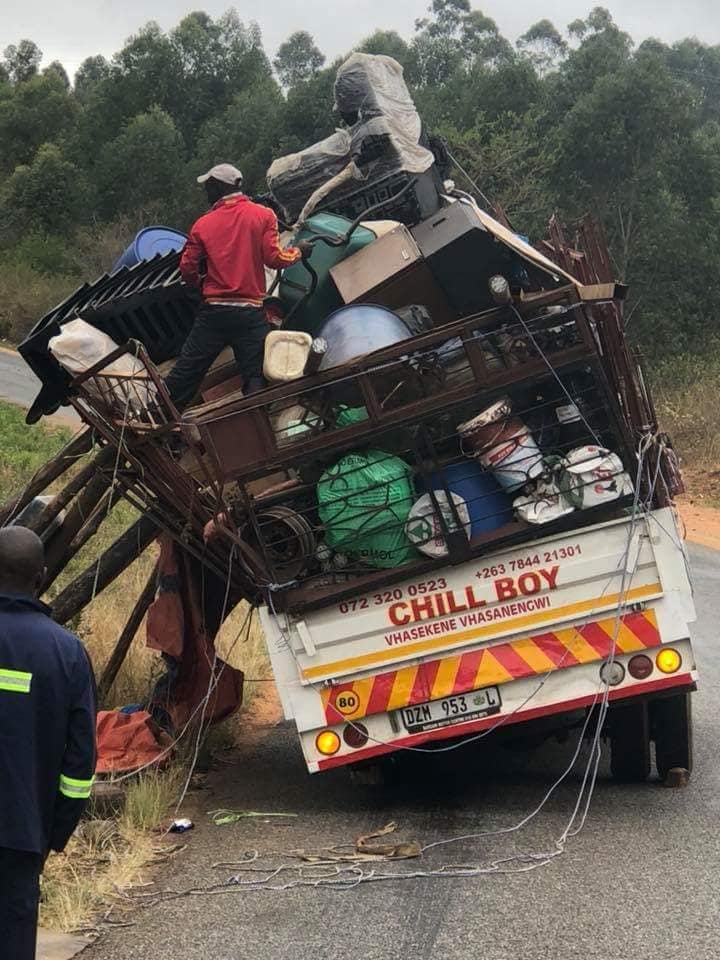 Overloaded night crawler truck stuck on the George's valley road