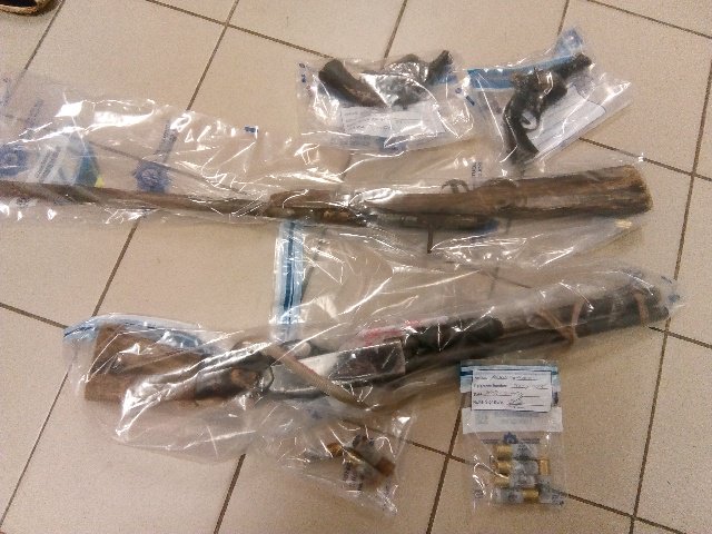 Four Suspects were arrested for possession of unlicensed firearms and ammo