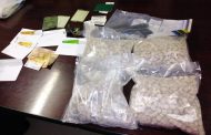 Suspect arrested for dealing in drugs and the possession of an unlicensed firearms.