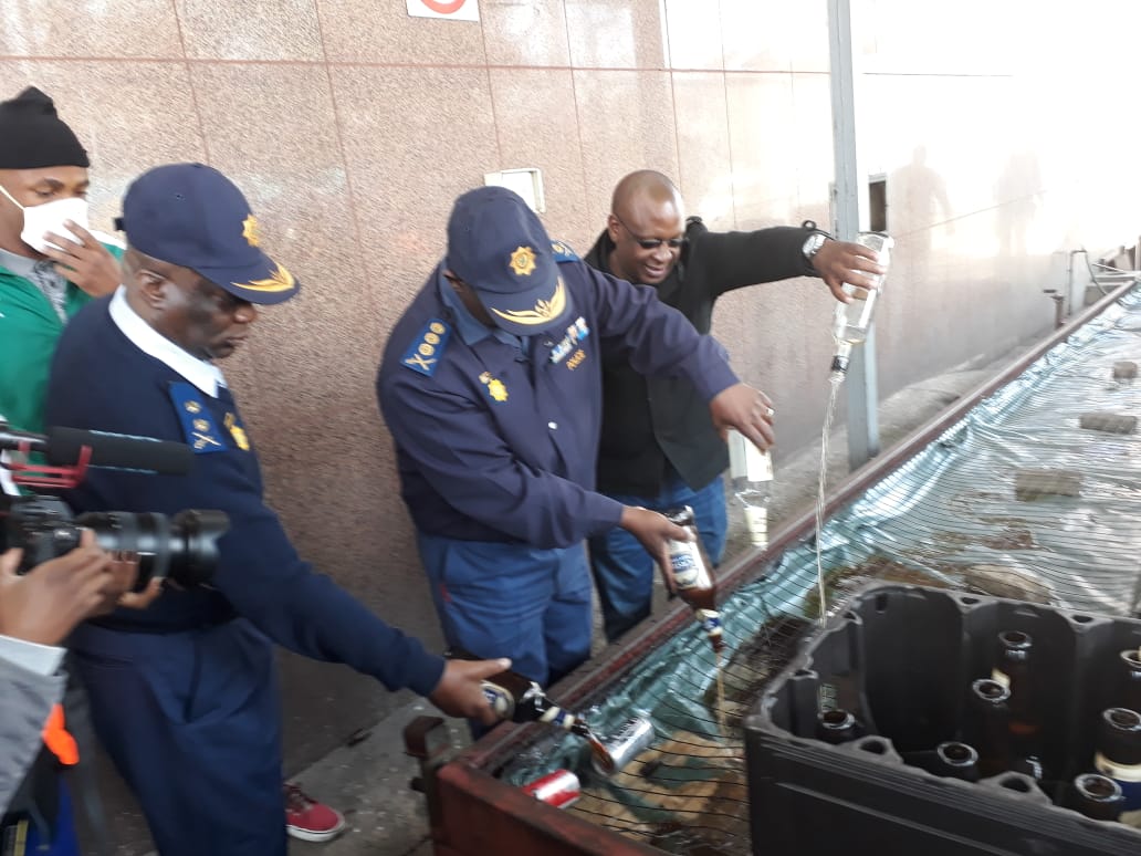 Gauteng Provincial Commissioner destroys confiscated liquor.