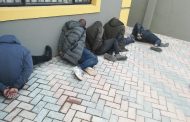 Police arrest six suspects and recover unlicensed firearms after robbery in Dragon City