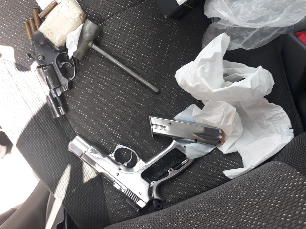 Suspect arrested for business robbery and possession of two unlicensed firearms