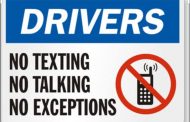 South African National Traffic law forbids drivers from using a cell phone or other electronic device at any time while their vehicle is in operation