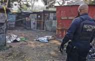 Two shot and killed outside their home in Canelands