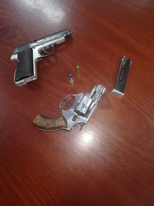 Suspect nabbed with two firearms linked to murder case