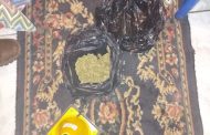 Police confiscate drugs and a firearm