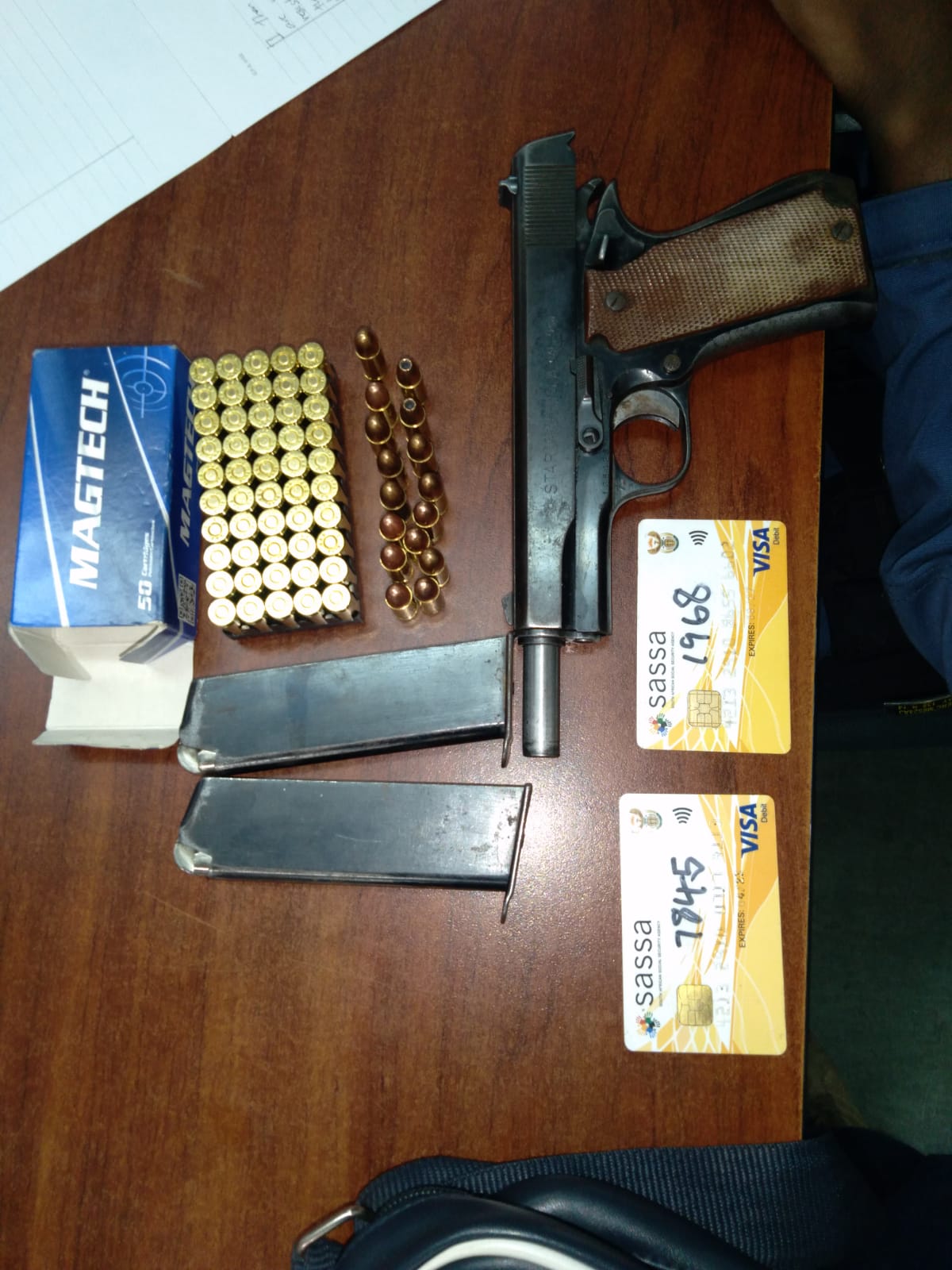 Three men nabbed with firearms and SASSA cards remanded in custody