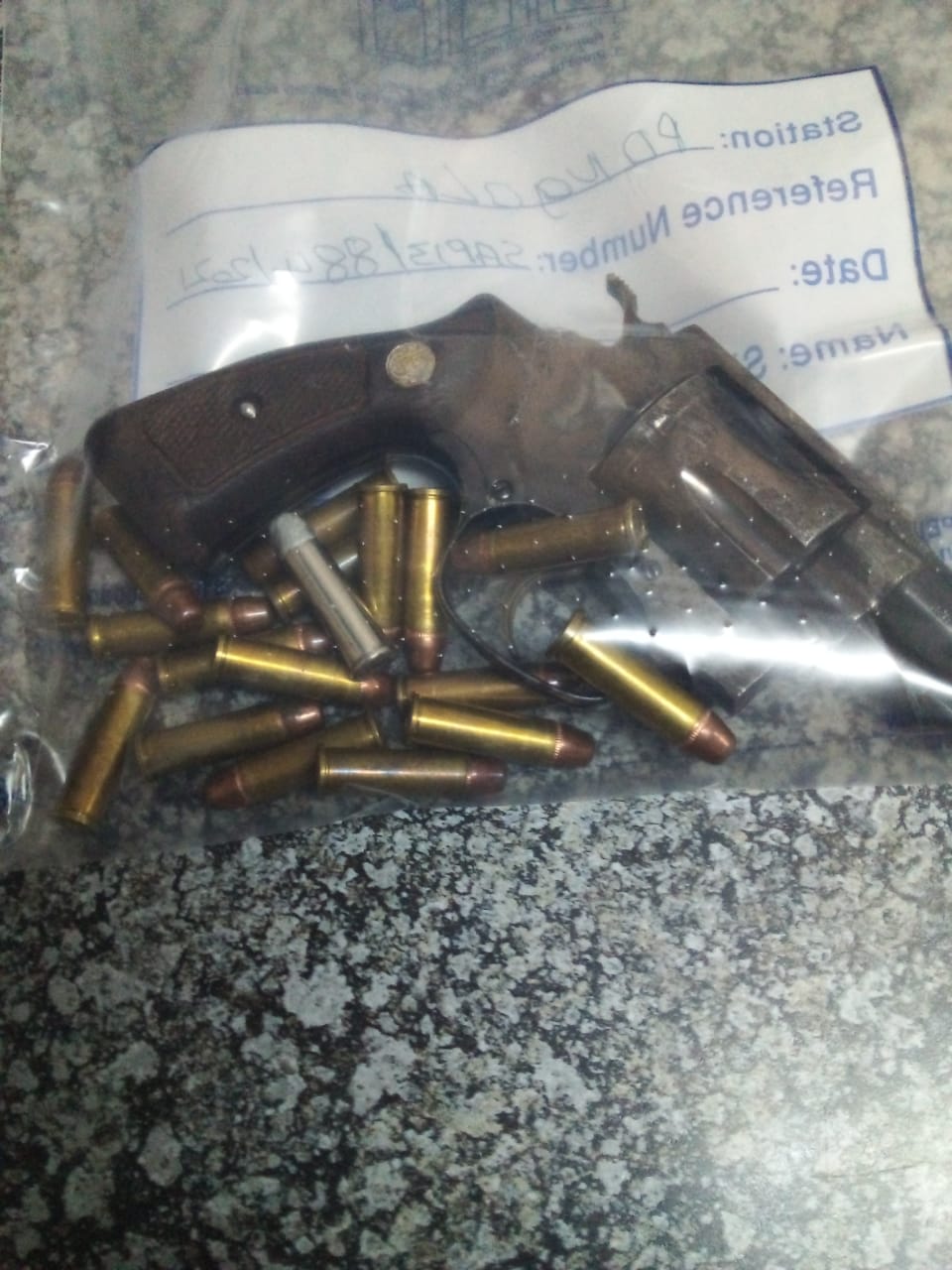 Murder suspect in court after being nabbed with a stolen firearm