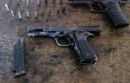 Suspect arrested with two firearms and ammunition