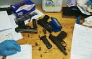Police arrested three suspects and seized four unlicensed firearms and ammunition