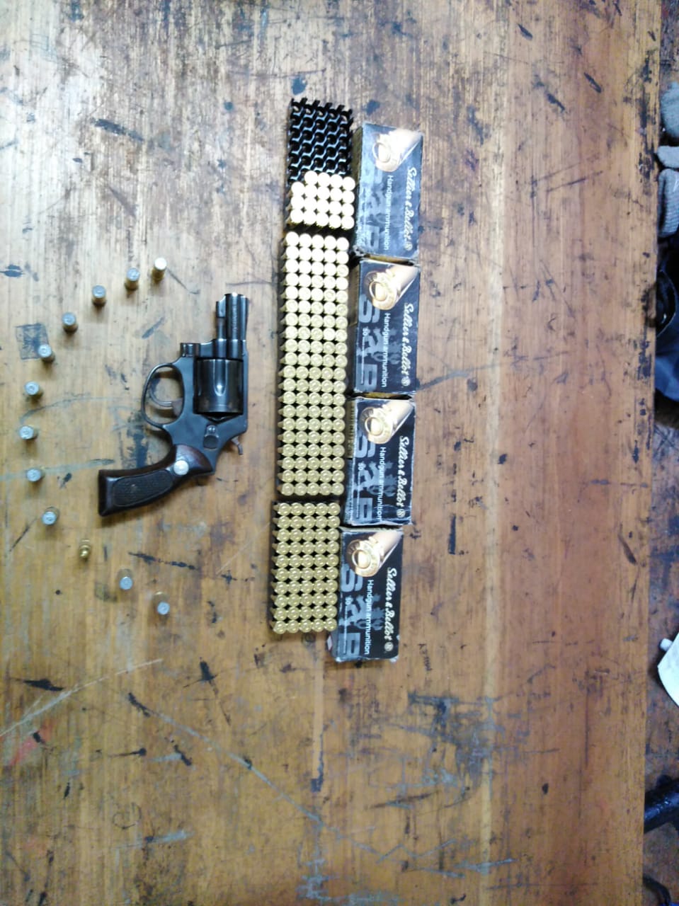 Suspect arrested with unlicensed firearm and ammunition