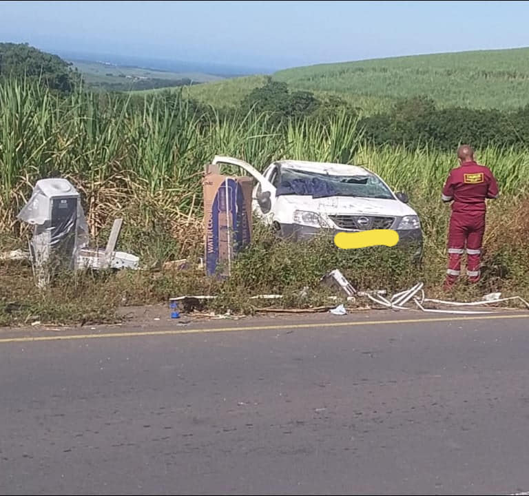 Vehicle carrying water coolers overturns at Nonoti