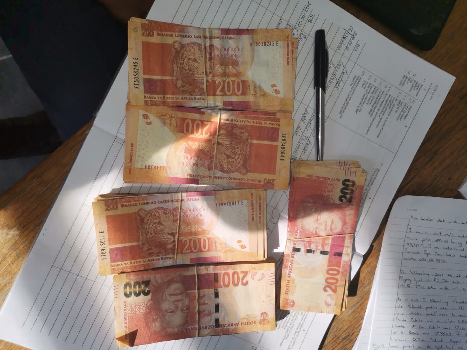 Suspects face court for possession of counterfeit money and bank cards