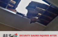 A security guard has been seriously injured after falling through a roof at business premises on Bluff Road