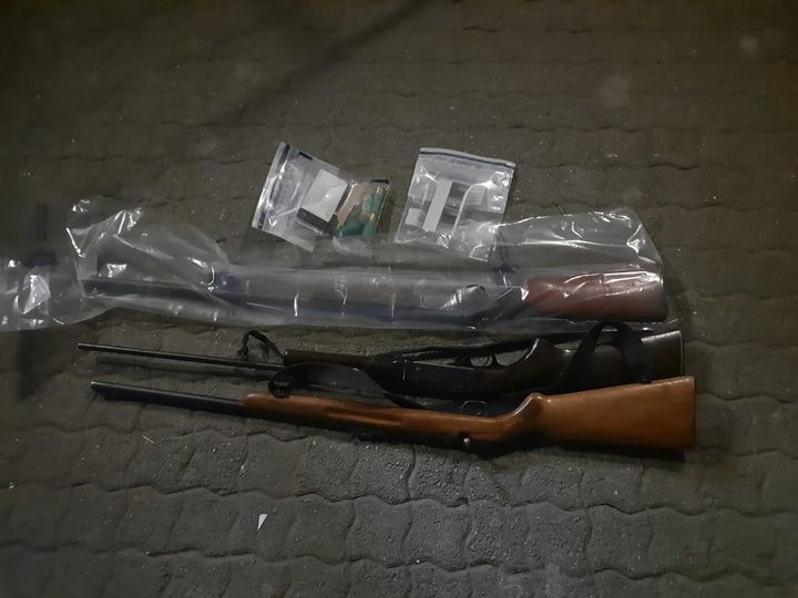 Firearms removed from unlawful owner, suspect arrested