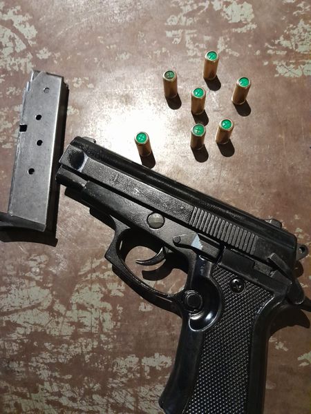 Police arrest alleged members of a taxi association for possession of unlicensed firearms and ammunition