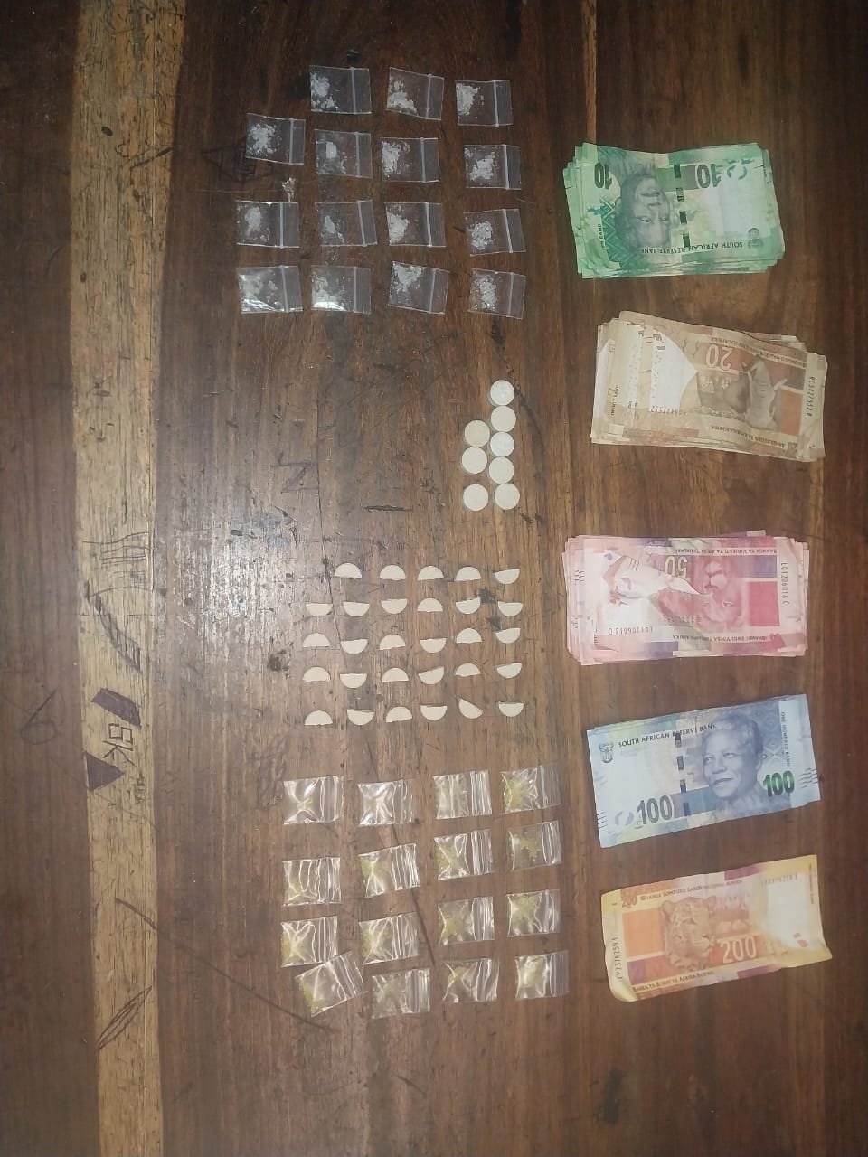Police members clamp down on suspects in the Western Cape