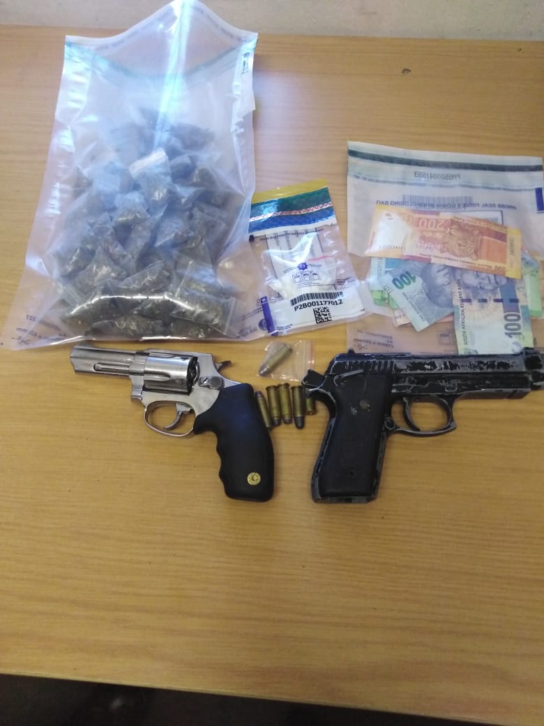Suspects face charges for the possession of an unlicensed firearm and drugs