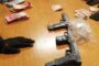 Suspects face charges for the possession of unlicensed firearms and dealing in liquor without a license