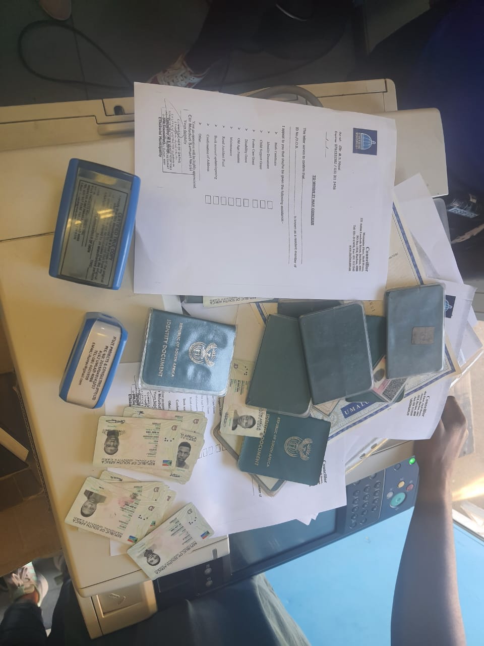 Three arrested for selling fraudulent proof of residence certificates at Kwamnyandu Mall in Umlazi