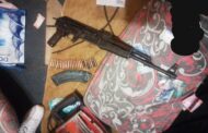 Man nabbed for possession of a rifle and stained cash