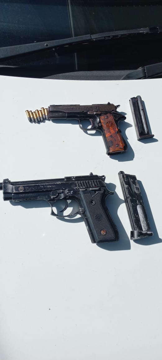 Suspects arrested for the possession of illicit firearms and drugs