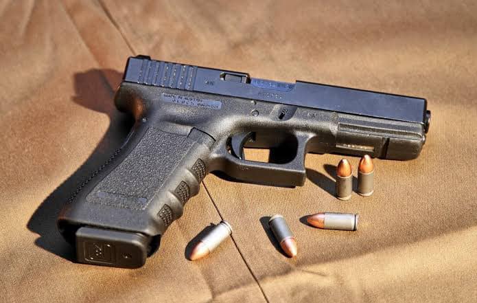 Students brandish firearms at a school in Durban