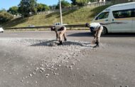 TMPD members assisting with cleaning the road on the N4 after a truck lost its load