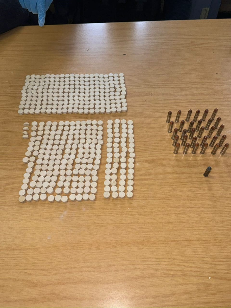 Suspects appear in court for the illegal possession of ammunition and drugs