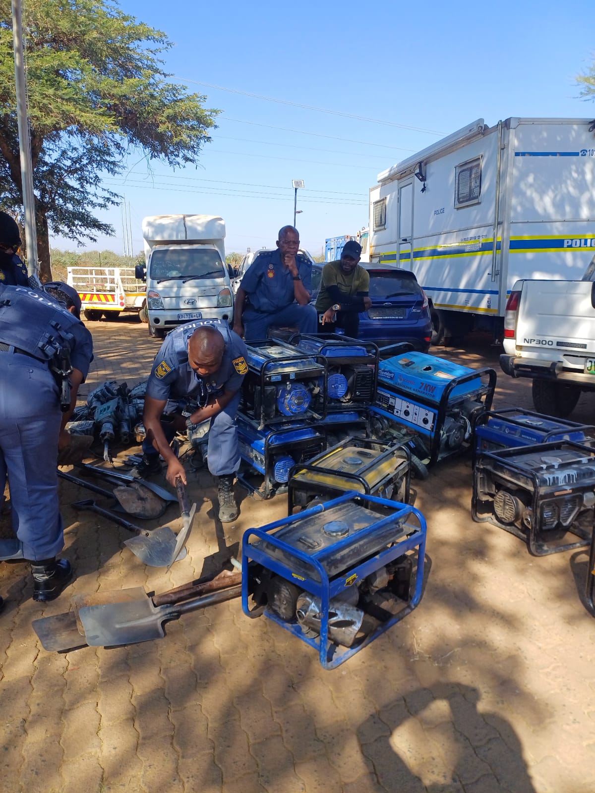 Accused persons appear in court for illegal possession of firearm and contravention of Immigration Act
