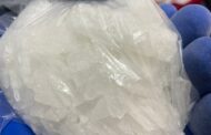 Members of Border police remove drugs during a follow-up visit at a drug house